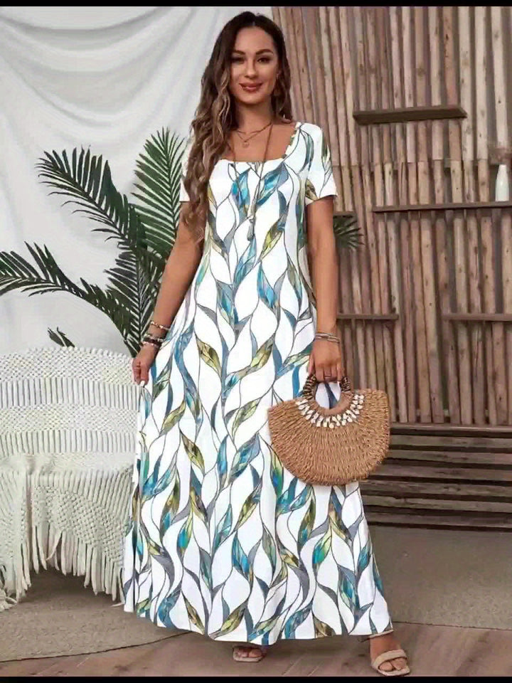 VanBruggen™ | Maxi jurk met geometrische print en vierkante halslijn
